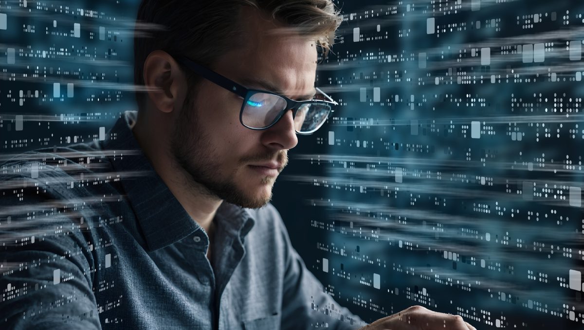Someone reviewing a stream of data on screen